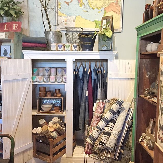 This beautiful new cabinet has brightened up our little corner of the world and is the perfect place for our @hausinterior candles and @portlandaproncompany aprons.