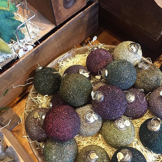 Beautiful textured tree decorations in rich colors The shop is open 11-6, come see all of the amazing decorations to get you & your family in the holiday spirit!