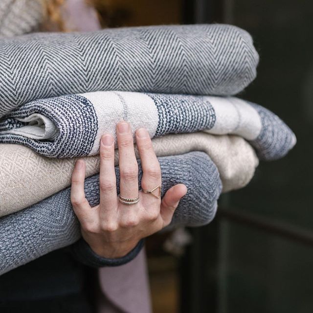 We prefer our blankets stacked and bundled! The cozier, the better! Tons of new styles in the shop- and they make a perfect gift for the holidays!
